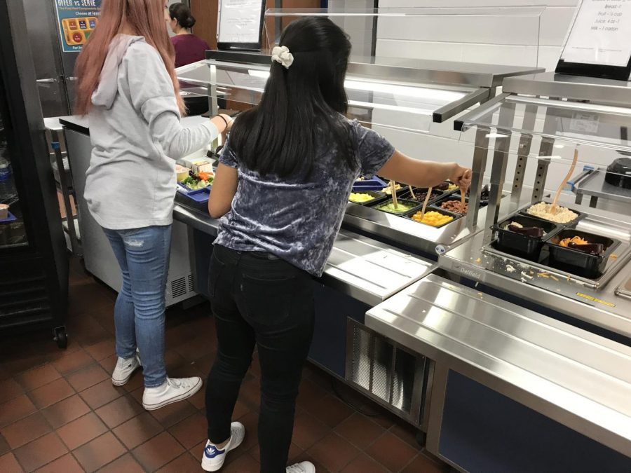 The cafeteria salad bar line is not serving Romaine lettuce because of the E. coli recall. No word on when Romaine lettuce will return to CHS. Photo by VM Smith. 