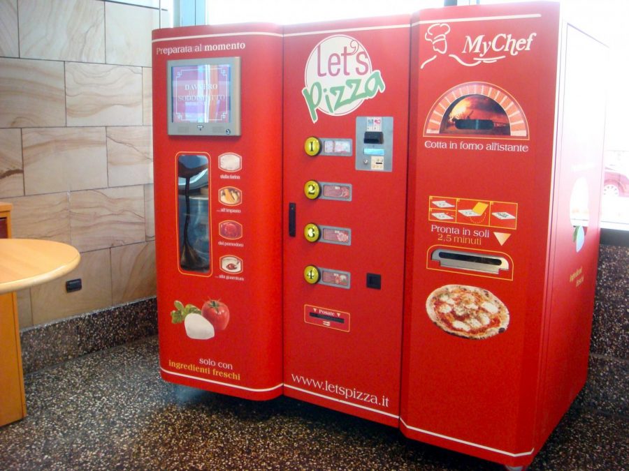 In Milan, Italy, people can purchase pizza directed though an automated pizza maker.  Photo from Creative Commons. 