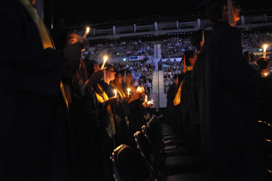 2019+graduates+light+candles+to+close+out+the+last+years+ceremony+at+the+Allen+County+Memorial+Coliseum.+This+years+graduation+ceremony+has+been+postponed+because+of+the+coronavirus+outbreak.+