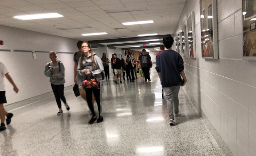 Students rush against the seven minute passing period to make it to class on time. 