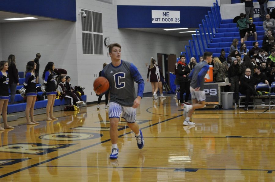 Seen last season, Senior Forward Sam Strycker warms up for a home match. This season, the team looks to build upon last years SAC Holiday Championship success. File photo. 
