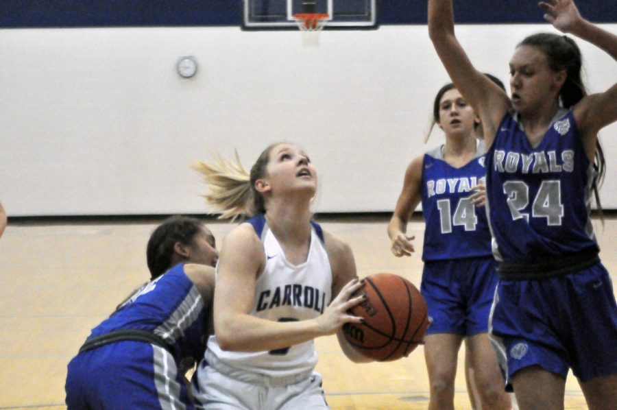 Senior Emily Parrett, G, drives the lane against Hamilton SE. The girls fell to the 6th-ranked Royals 51-47.  