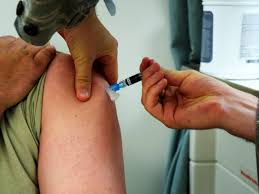 A person being vaccinated. Photo courtesy of Creative Commons. 