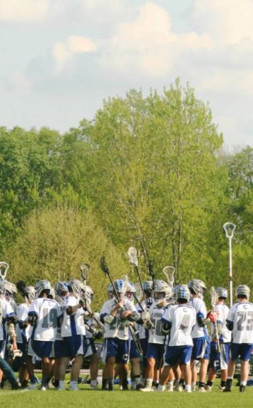 The Carroll Lacrosse team about to take the field.