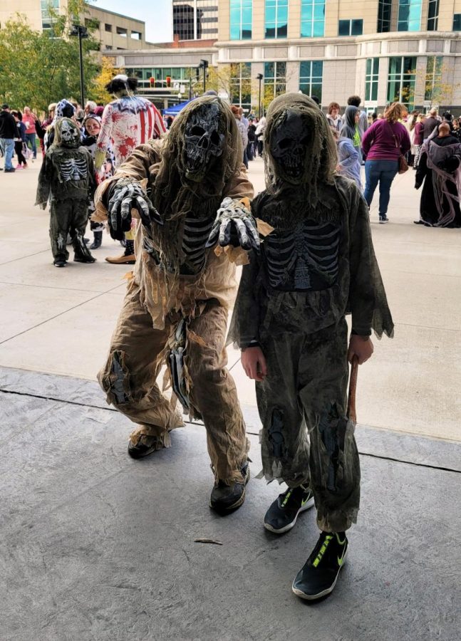 People in costume posing at the event.