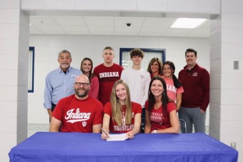 Mya DeWitt signing with Indiana University for swimming. 