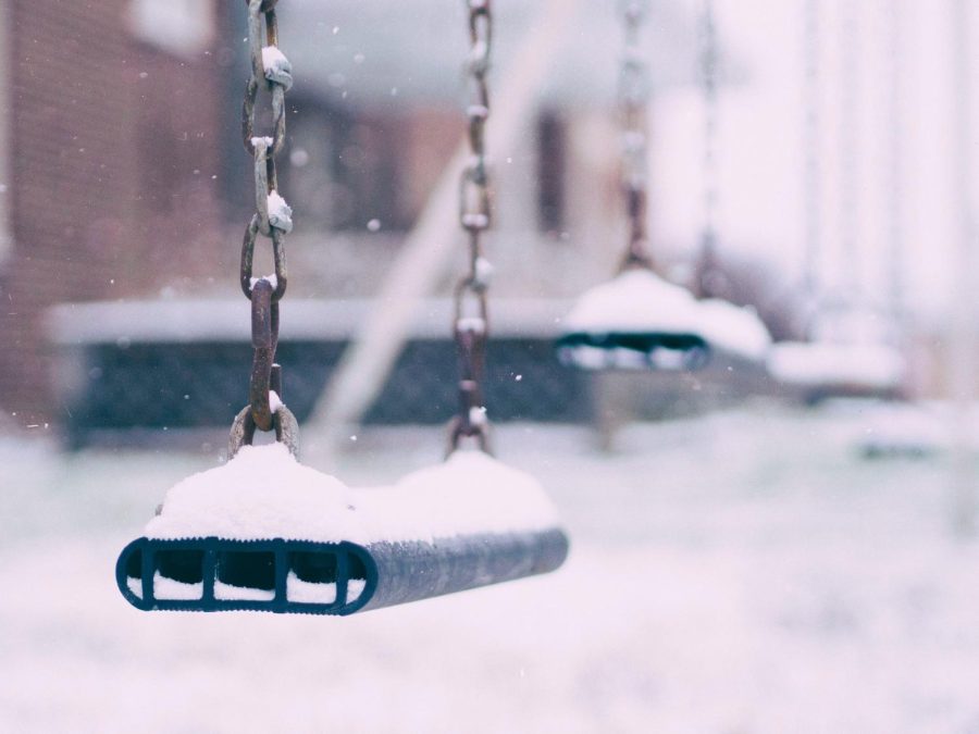 Snowy+playground+swing.+Picture+taken+by+Aaron+Burden