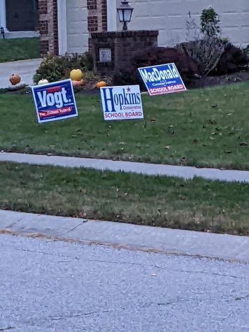 All around the NACS district, signs advertising school board candidates are posted
