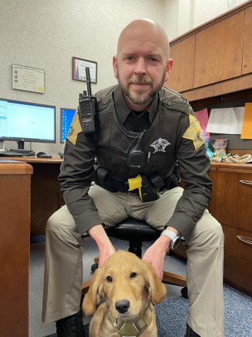 SRO Butler and his K-9 assistant, Harlie.
