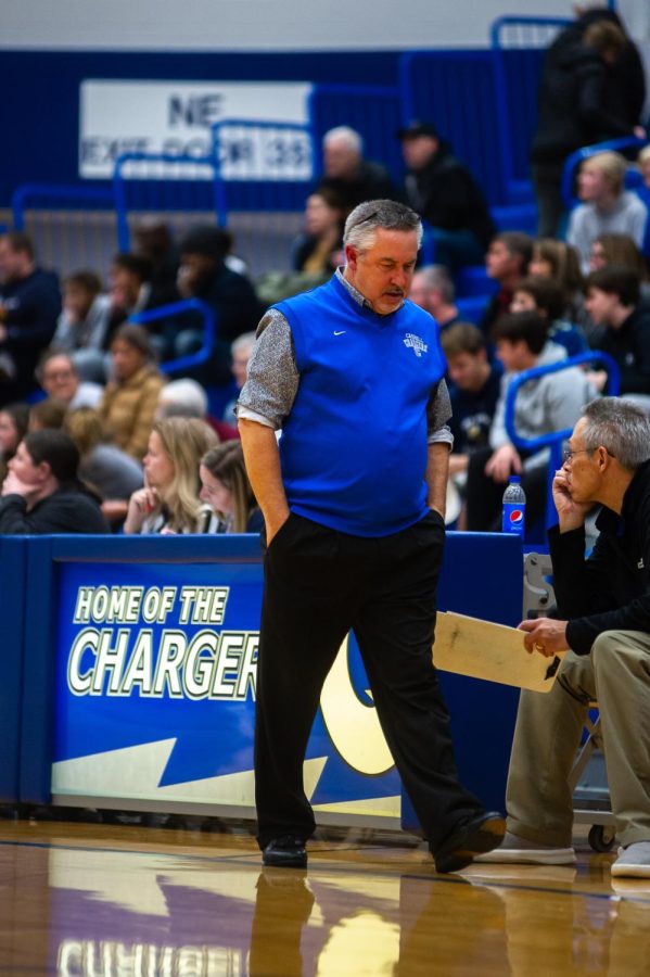 Coach Mark Redding walks with his head down, frustrated at a call made in the 4th Quarter. Photo by Avah Crane.