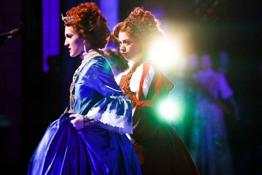 Seniors Jaina Berry and Triniti McFarland as Queen Elizabeth and Queen Mary of Scots in Select Sounds show choir show, Queen Anointed. Photo by Purpose Photography (Nancy Scholz).