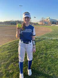 Freshman Pitcher Taylor Danley poses with her first Home Run Ball. 
Her homer was the only one of the night in a 23-1 victory for Carroll over Warsaw. 