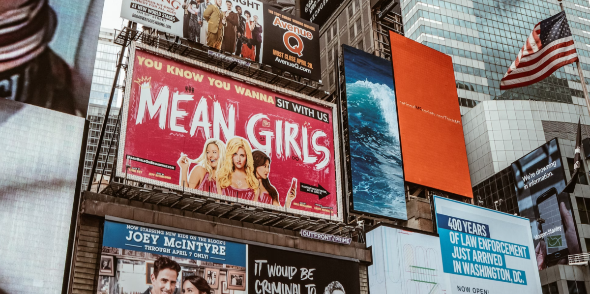 A Times Square advertisement of the Mean Girls Broadway Musical, which was inspiration for the 2024 movie. Photo by Mathias Arlund on Unsplash.