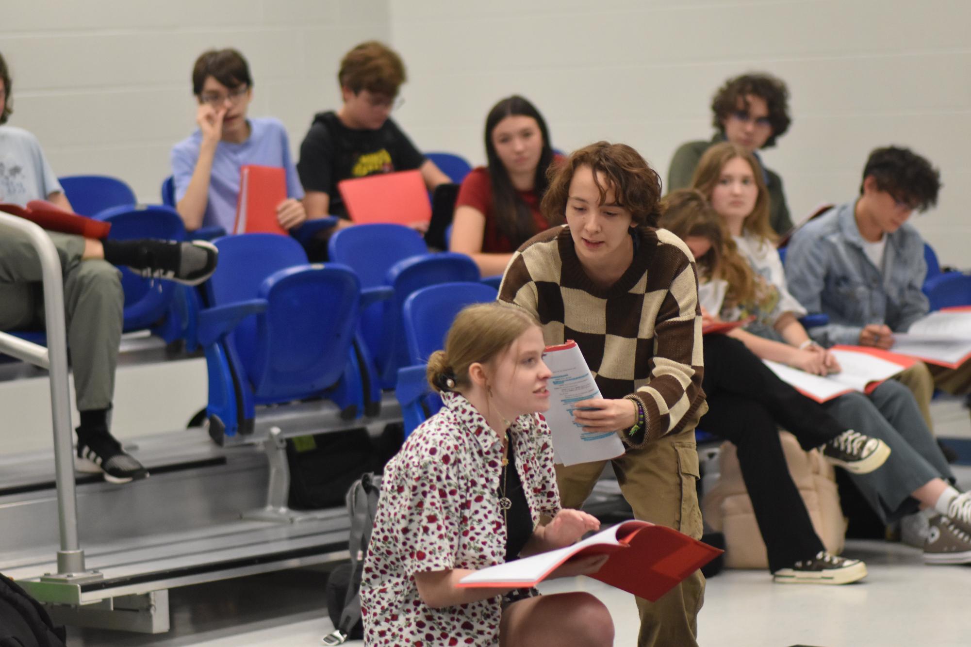 In rehearsal, juniors Abby Swihart and Josie Berry work hard to perfect a scene in "Night of the Living Dead, Live." The play opens Thursday at 7 p.m. and runs Friday and Saturday at 7 p.m. in the large auditorium.