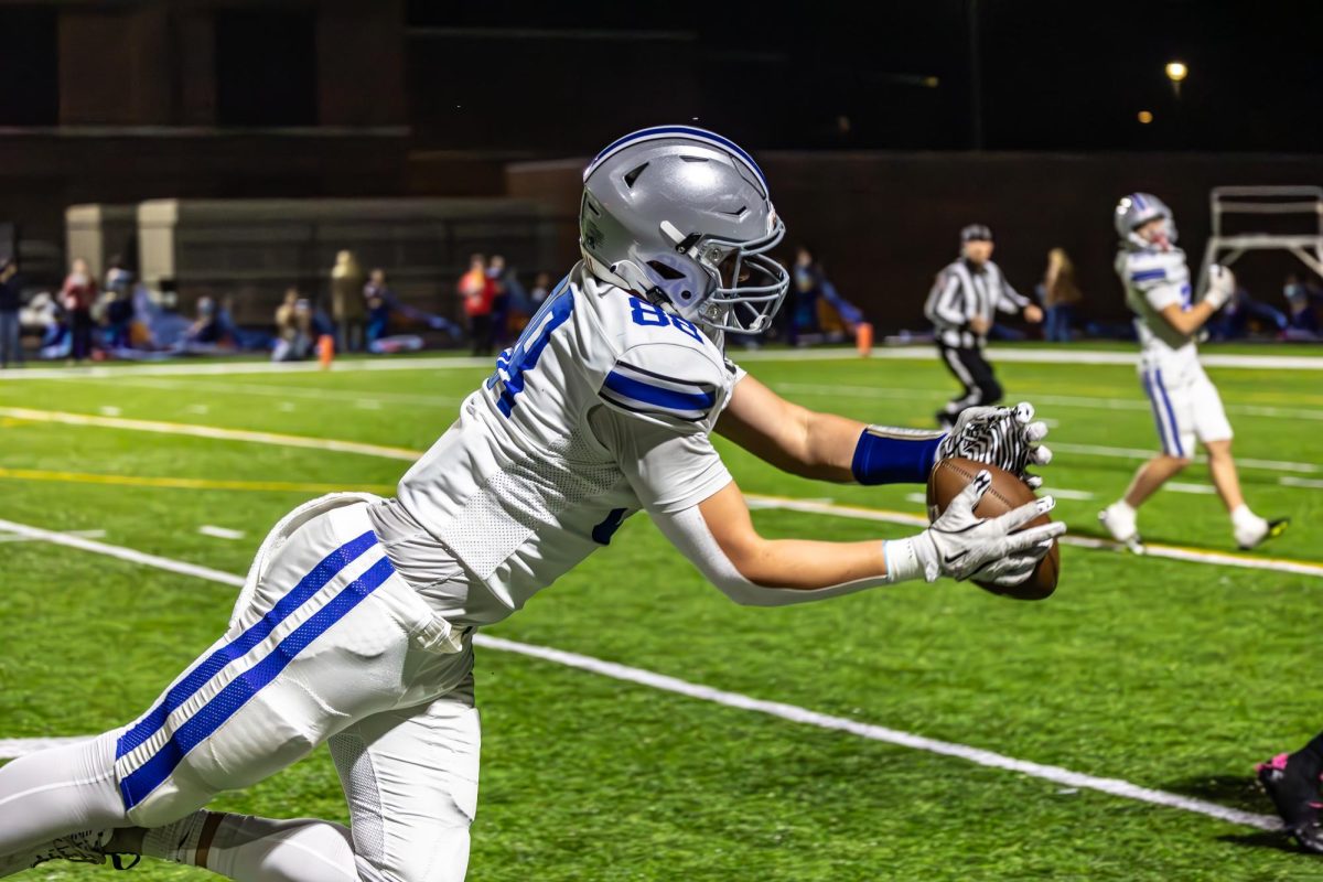 Brady Rhoad Snagging a Ball on the Sidelines vs North Side.