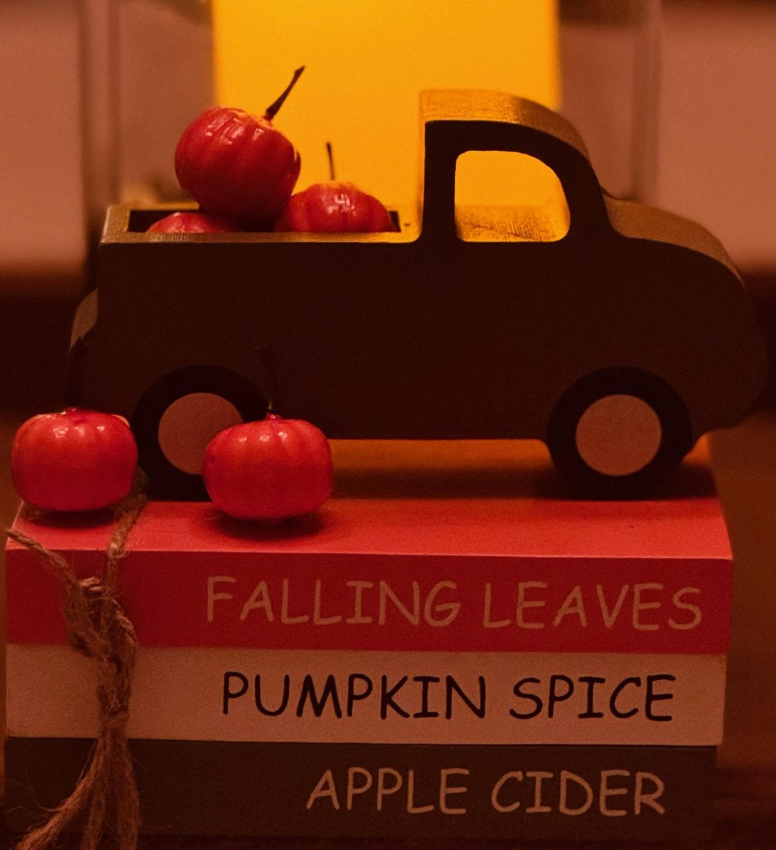 Little wooden truck with plastic pumpkins