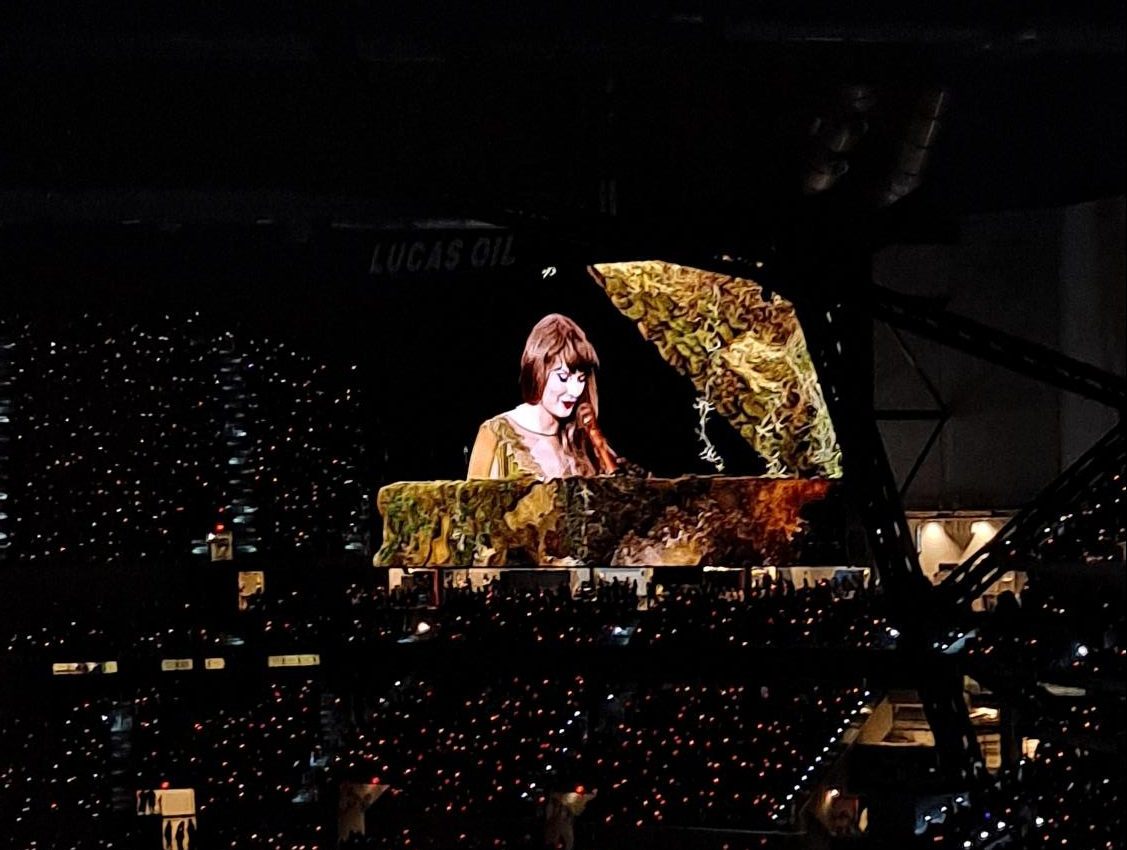 Taylor playing the Folklore/Evermore piano for her Eras Tour.