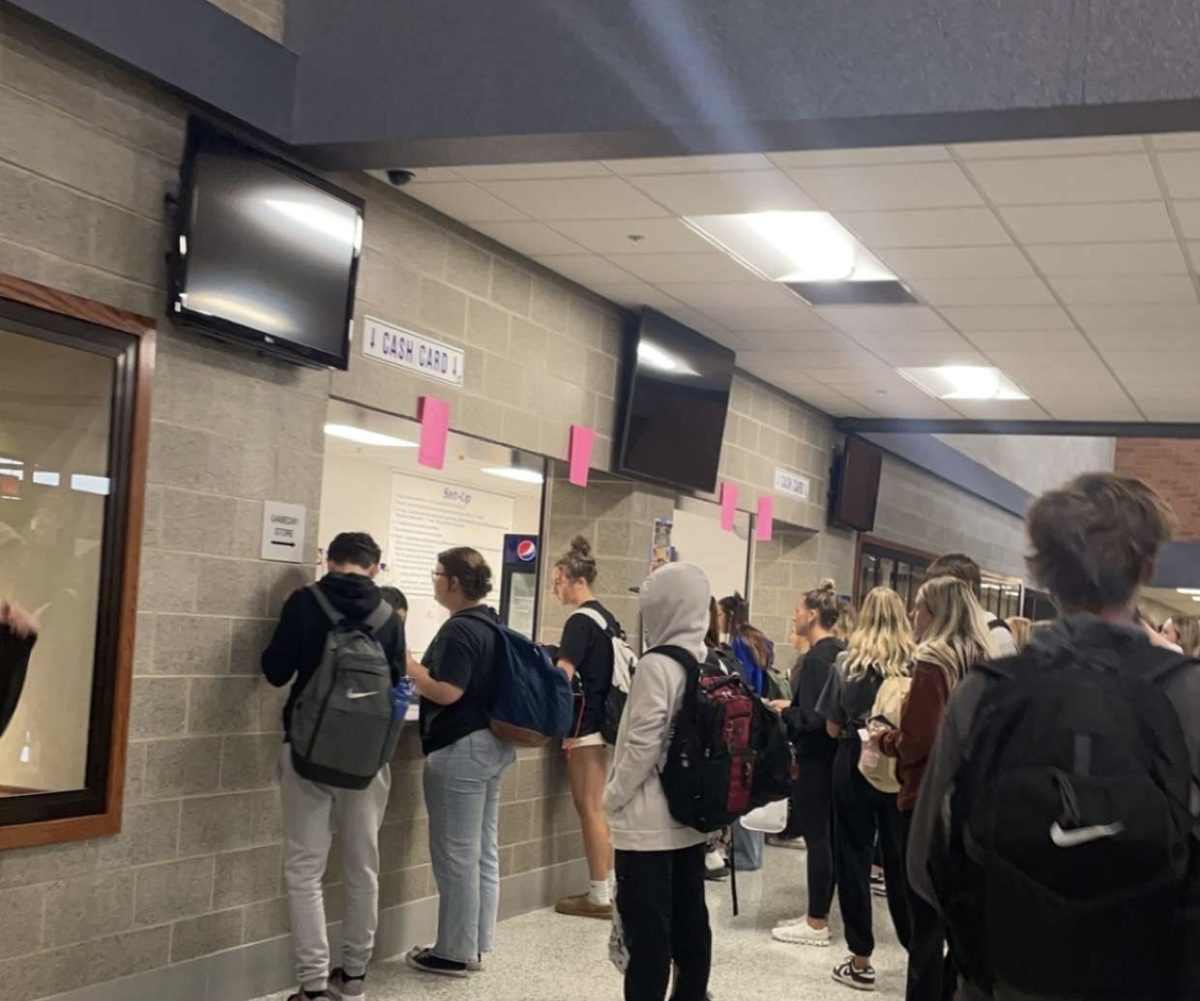 Students line up to buy tickets for Saturday's Semi-Formal Dance.